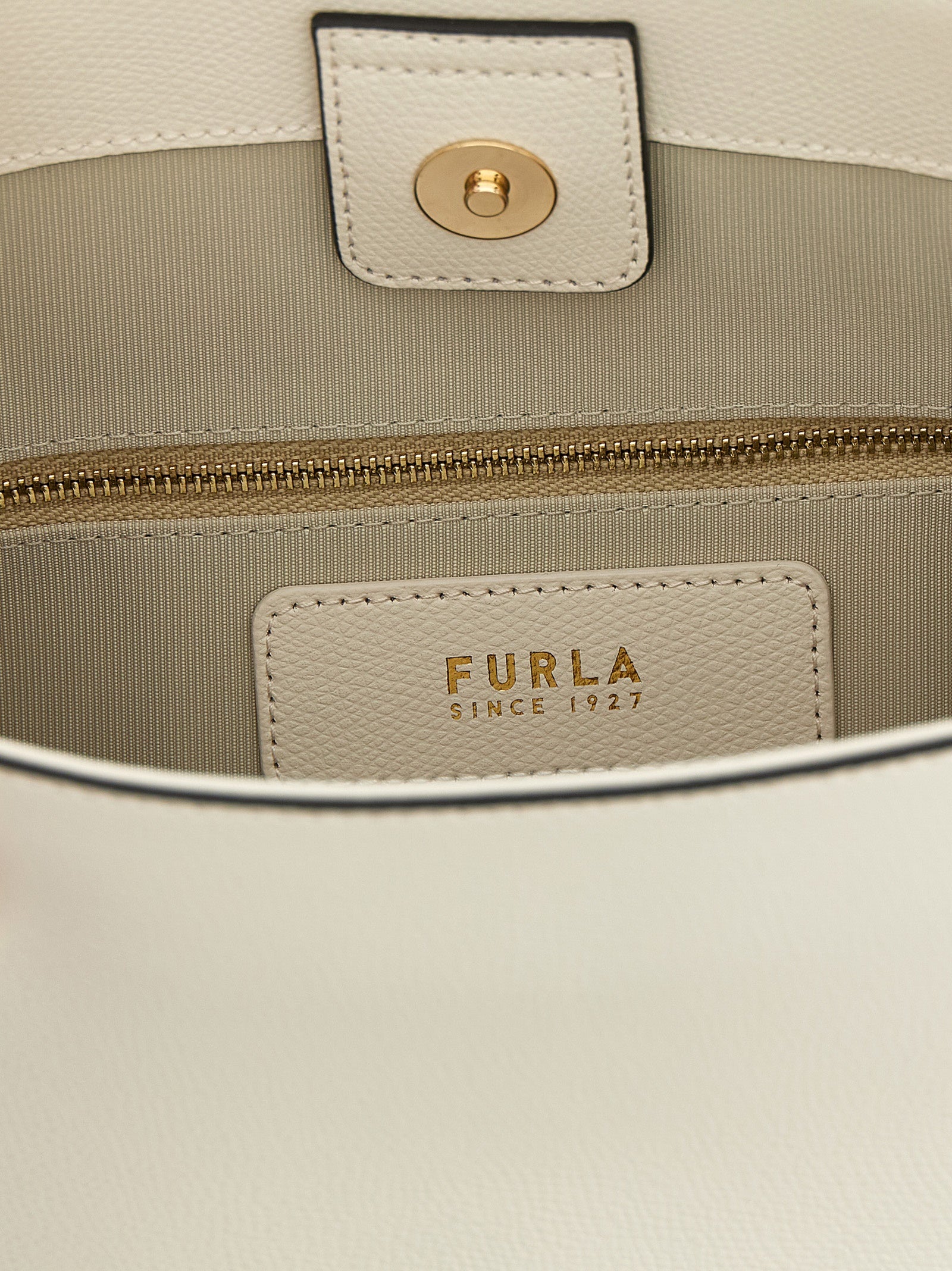 Small Shoulder Bucket Bag by Furla for women in calfskin leather white & print features a stately silhouette, showcasing a secure , ample , and stately shoulder-strap & adjustable-strap for a stately finish.