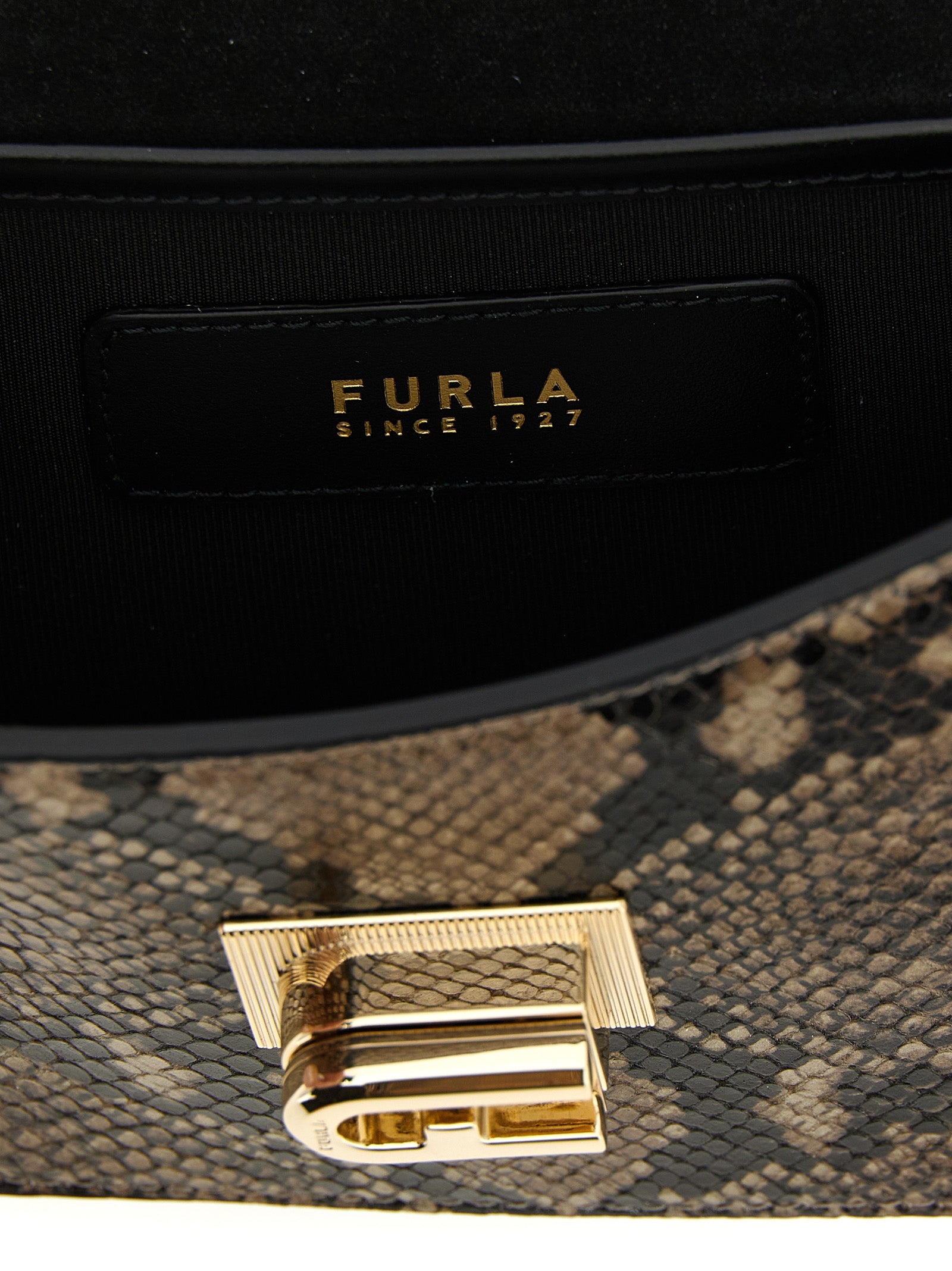 Mini 2-in-1 Shoulder & Crossbody Flap Handbag by Furla for women in leather gray features an multi-faceted design with a secure flap, ample , and versatile crossbody-strap & shoulder-strap for a multi-faceted finish.