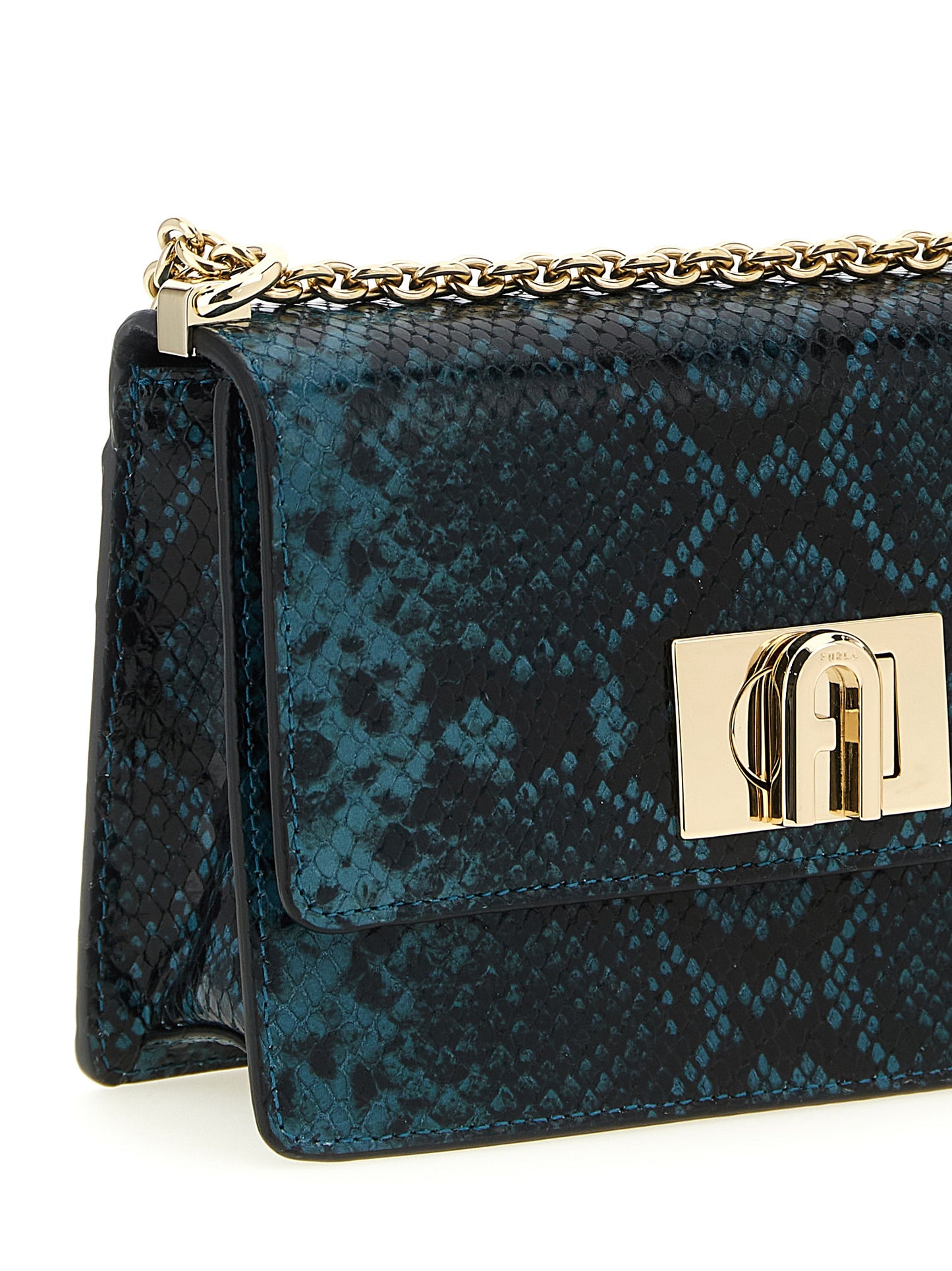 Mini Crossbody Flap Handbag by Furla for women in calfskin leather blue features an multi-faceted design with a secure flap, ample , and versatile crossbody-strap & shoulder-strap for a multi-faceted finish.