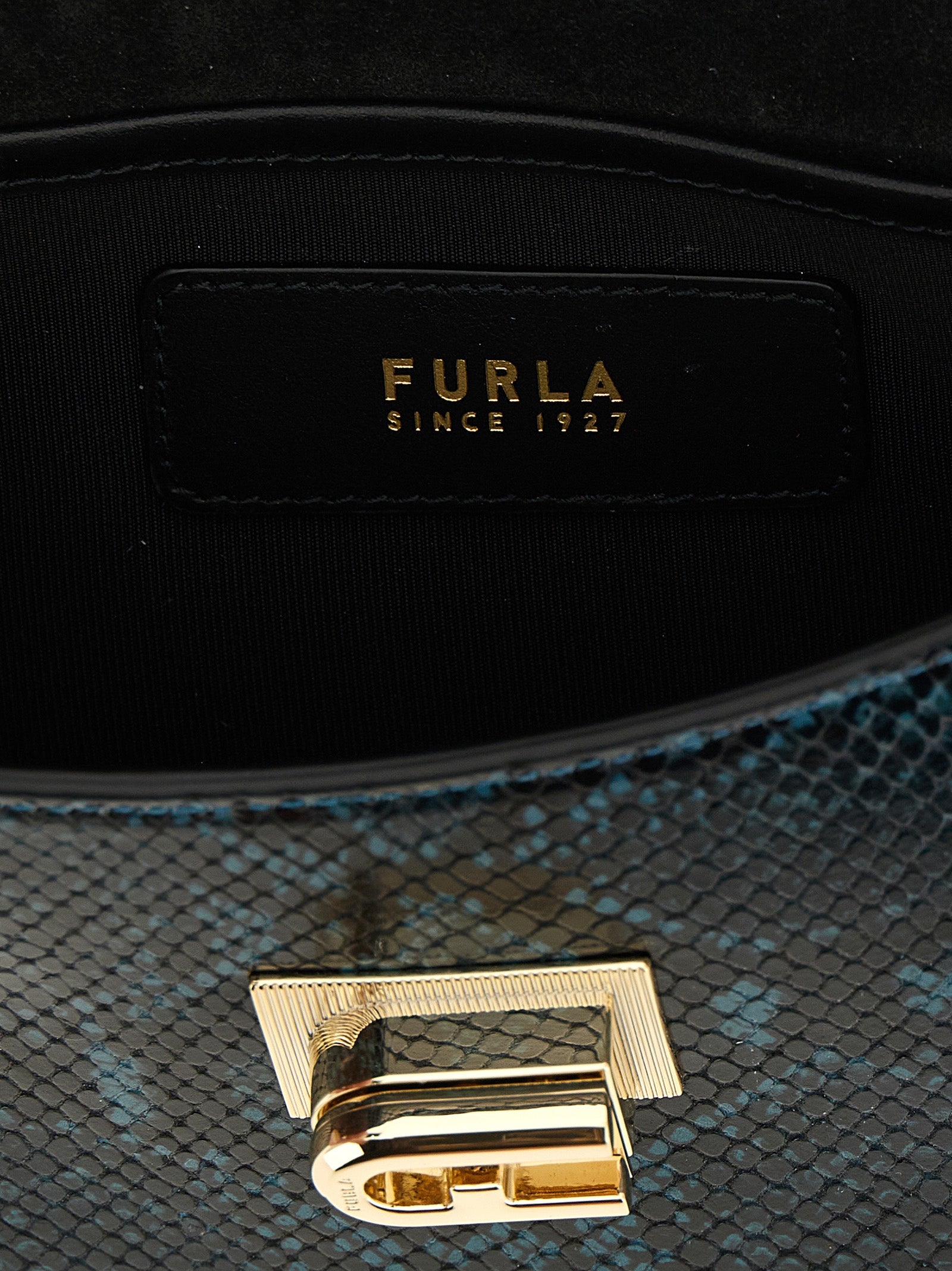 Mini Crossbody Flap Handbag by Furla for women in calfskin leather blue showcases a versatile sophistication silhouette, featuring a secure flap, versatile sophistication , and versatile crossbody-strap & shoulder-strap for a versatile sophistication finish.