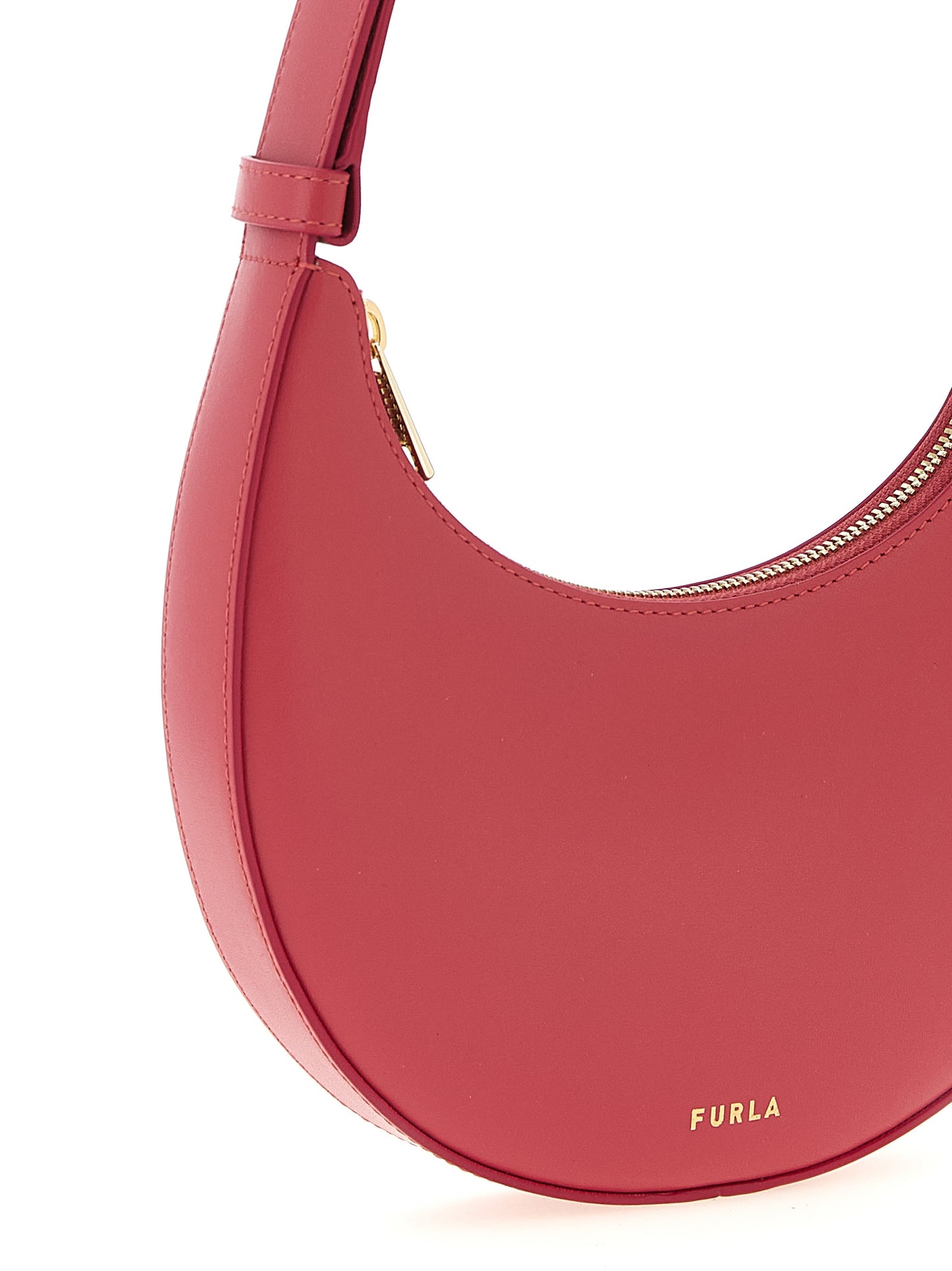 Mini Shoulder Crescent Bag by Furla for women in bos taurus calf suede leather fuchsia showcases a statuesque silhouette, artfully detailed with a secure zipper, organized , and versatile shoulder-strap, adjustable-strap & handle for a statuesque look.