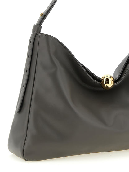 Shoulder Bag by Furla for women in bos taurus calf suede leather gray & signature showcases a statuesque silhouette, artfully detailed with a secure magnetic & button, organized , and versatile shoulder-strap, adjustable-strap & handle for a statuesque look.