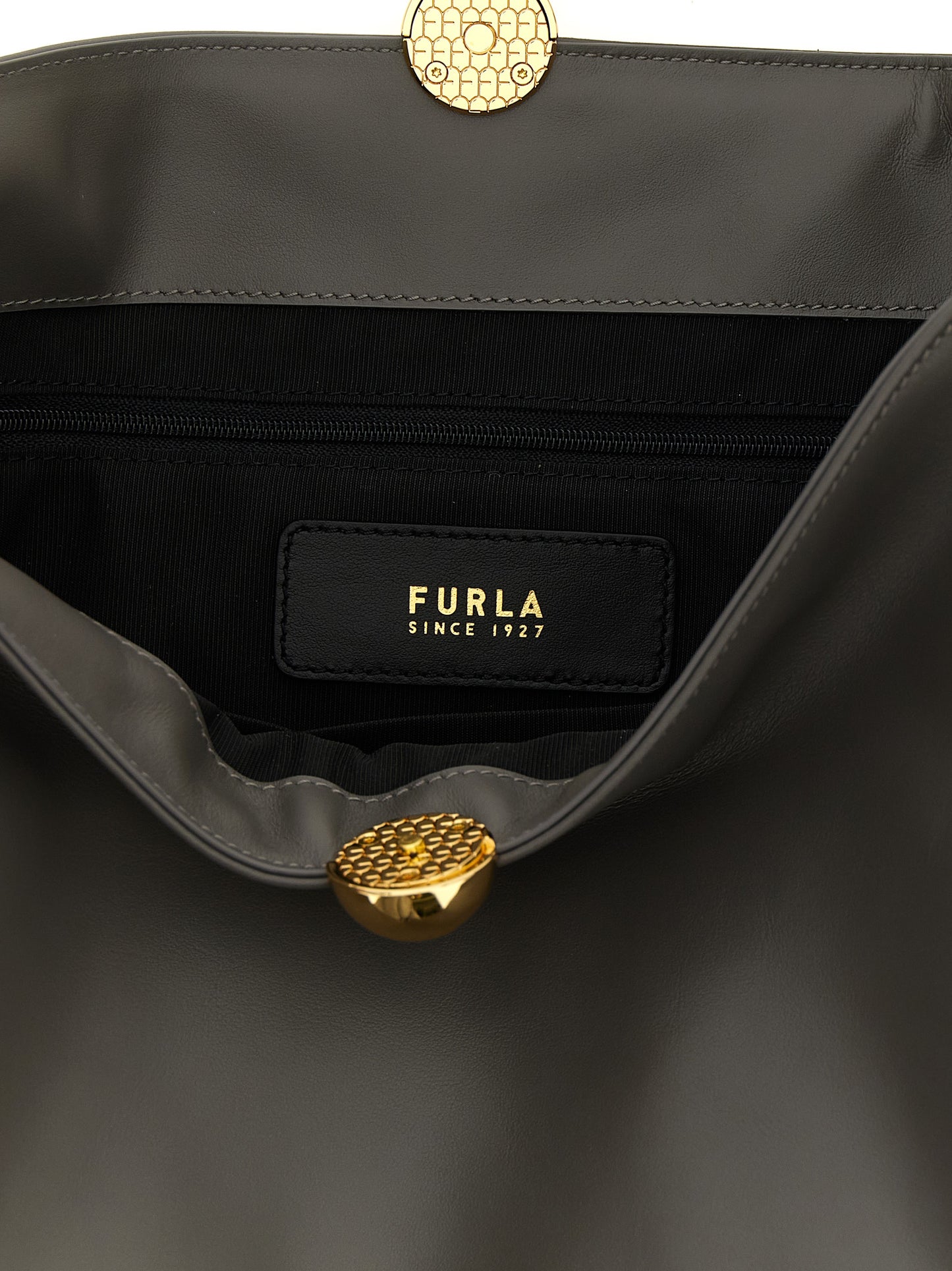 Shoulder Bag by Furla for women in bos taurus calf suede leather gray & signature features an effortlessly chic silhouette with a secure magnetic & button, ample , and versatile shoulder-strap, adjustable-strap & handle for effortlessly chic everyday luxury.