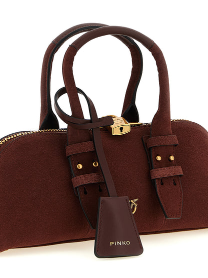 Shoulder Bowling Baguette Bag by PINKO for women in bos taurus calf suede leather bordeaux presents a statuesque silhouette, showcasing a secure zipper and statuesque with versatile shoulder-strap, adjustable-strap & handle for a sophisticated look.