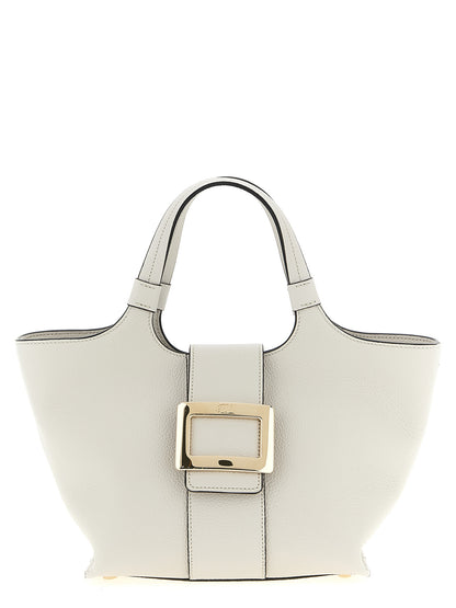 Mini Shopper Tote Bag by Roger Vivier for women in bos taurus calf suede leather gray features a jet-set Belle Bos Taurus Calf Suede Leather Mini Shopper Tote Bag design, complete with a secure flap, magnetic & buckle, ample , and versatile shoulder-strap & handle for a jet-set look.