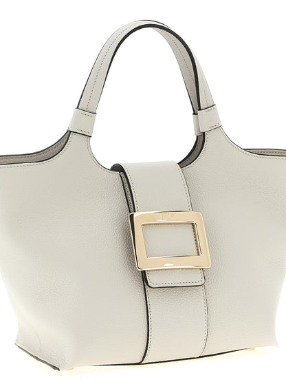 Mini Shopper Tote Bag by Roger Vivier for women in bos taurus calf suede leather gray showcases a statuesque Belle Bos Taurus Calf Suede Leather Mini Shopper Tote Bag design, featuring a secure flap, magnetic & buckle, ample , and versatile shoulder-strap & handle for a statuesque finish.