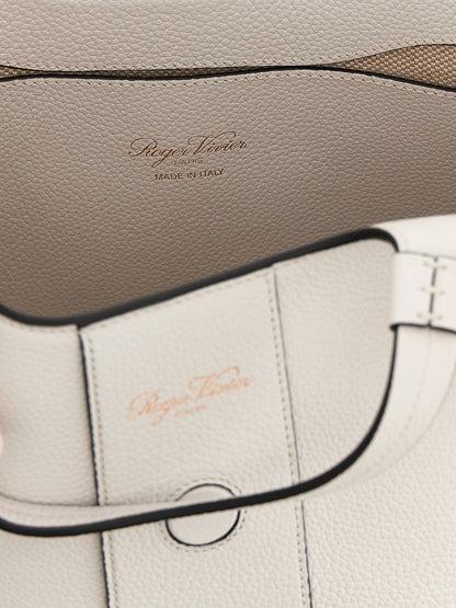 Mini Shopper Tote Bag by Roger Vivier for women in bos taurus calf suede leather gray features a jet-set sophisticated Belle Bos Taurus Calf Suede Leather Mini Shopper Tote Bag design with a secure flap, magnetic & buckle, ample , and versatile shoulder-strap & handle for a jet-set sophisticated finish.