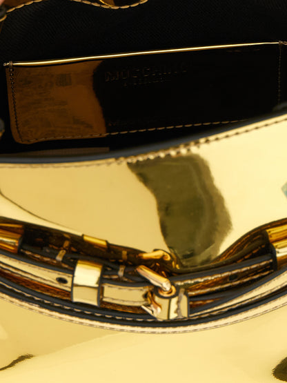Handbag by Moschino for women in polyester & polyethylene gold features an refined silhouette, showcasing a secure buckle & button, ample , and versatile shoulder-strap, adjustable-strap & handle for a sophisticated refined aesthetic.