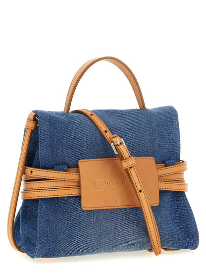 Handbag by Moschino for women in calf leather & cotton blue features a refined silhouette, showcasing a secure buckle & button, organized , and versatile shoulder-strap, adjustable-strap & handle for a refined finish.
