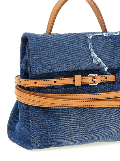 Handbag by Moschino for women in calf leather & cotton blue features an refined silhouette, showcasing a secure buckle & button, ample , and versatile shoulder-strap, adjustable-strap & handle for a sophisticated refined aesthetic.
