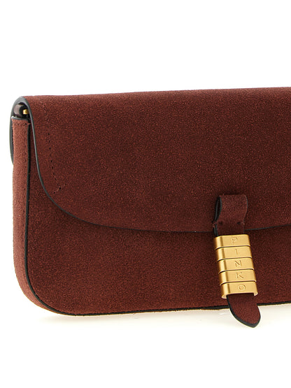 Medium Shoulder Saddle Bag by PINKO for women in cotton & leather bordeaux features a effortless sophistication silhouette, secured by a flap & magnetic with ample and versatile shoulder-strap & detachable-strap for a effortless sophistication finish.