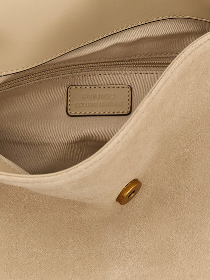 Shoulder Saddle Bag by PINKO for women in faux leather & cotton beige features a effortless chic silhouette with a secure flap & magnetic, ample , and versatile shoulder-strap & adjustable-strap for a effortless chic finish.