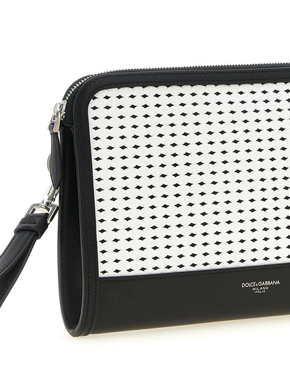 Clutch Handbag by Dolce & Gabbana for unisex in bos taurus calf suede leather bicolour, black, palladium & white features a architectural silhouette, showcasing a secure zipper, ample , and versatile handle for a architectural finish.