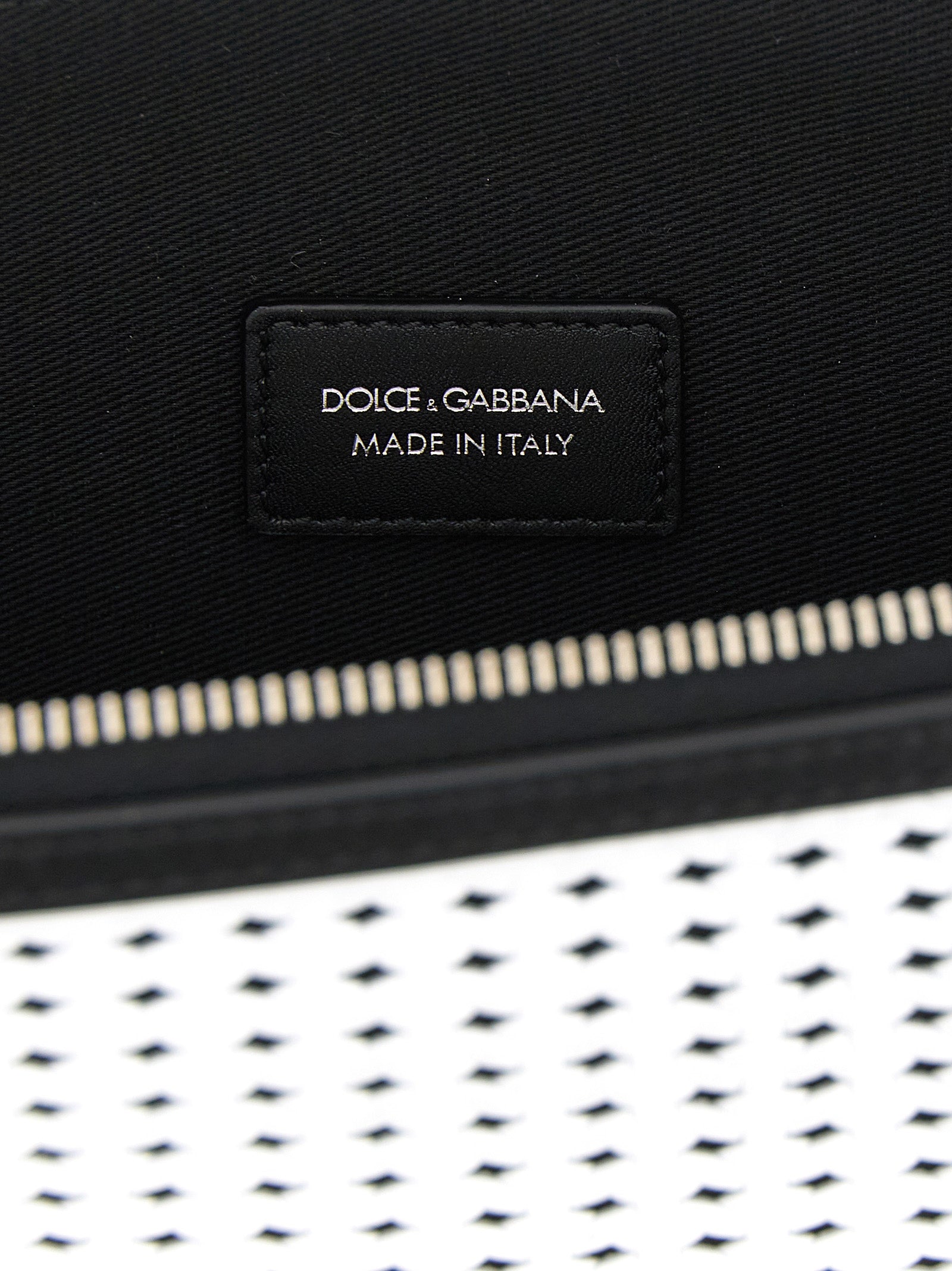 Clutch Handbag by Dolce & Gabbana for unisex in bos taurus calf suede leather bicolour, black, palladium & white showcases a sculptural silhouette, featuring a secure zipper, ample , and versatile handle for a sculptural finish.