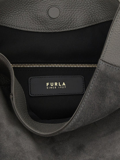 Medium Shoulder Bag by Furla for women in calfskin leather gray presents a statuesque silhouette, showcasing a secure magnetic and statuesque with versatile shoulder-strap & handle for a sophisticated look.