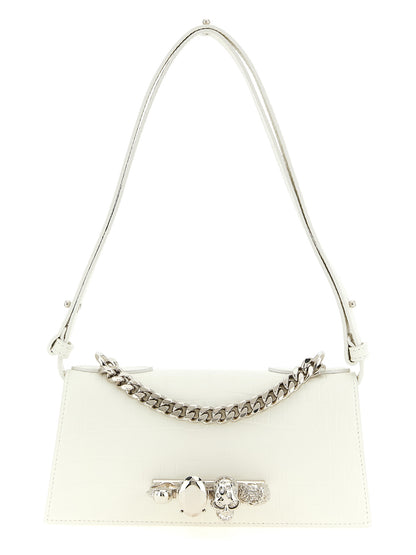 Mini Shoulder Flap Bag by Alexander McQueen for women in calfskin leather white, signature & print presents a statuesque silhouette, showcasing a secure flap & magnetic and statuesque with versatile shoulder-strap, adjustable-strap & handle for a sophisticated look.