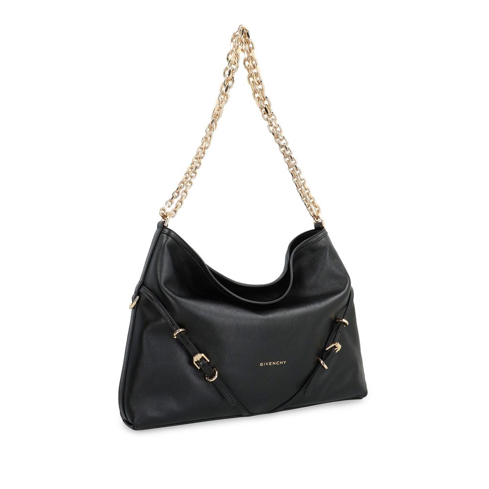 Shoulder Bag by Givenchy for women in calfskin leather & cotton black & gold features a stately silhouette, showcasing a secure , ample , and stately shoulder-strap & adjustable-strap for a stately finish.