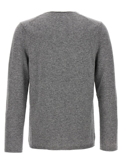 Cardigan by Comme Des Garçons for men in wool gray features an impeccable silhouette, showcasing a sophisticated and detail for a truly impeccable finish.