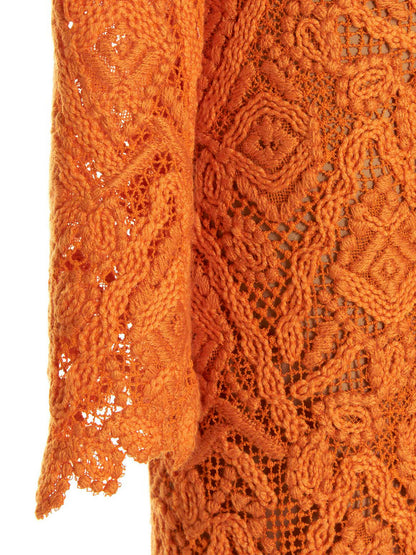 Dress by Ermanno Scervino for women in polyester cotton & wool orange, patterned & floral features a dramatic silhouette, showcasing an elegant and that flows into a dramatic midi.