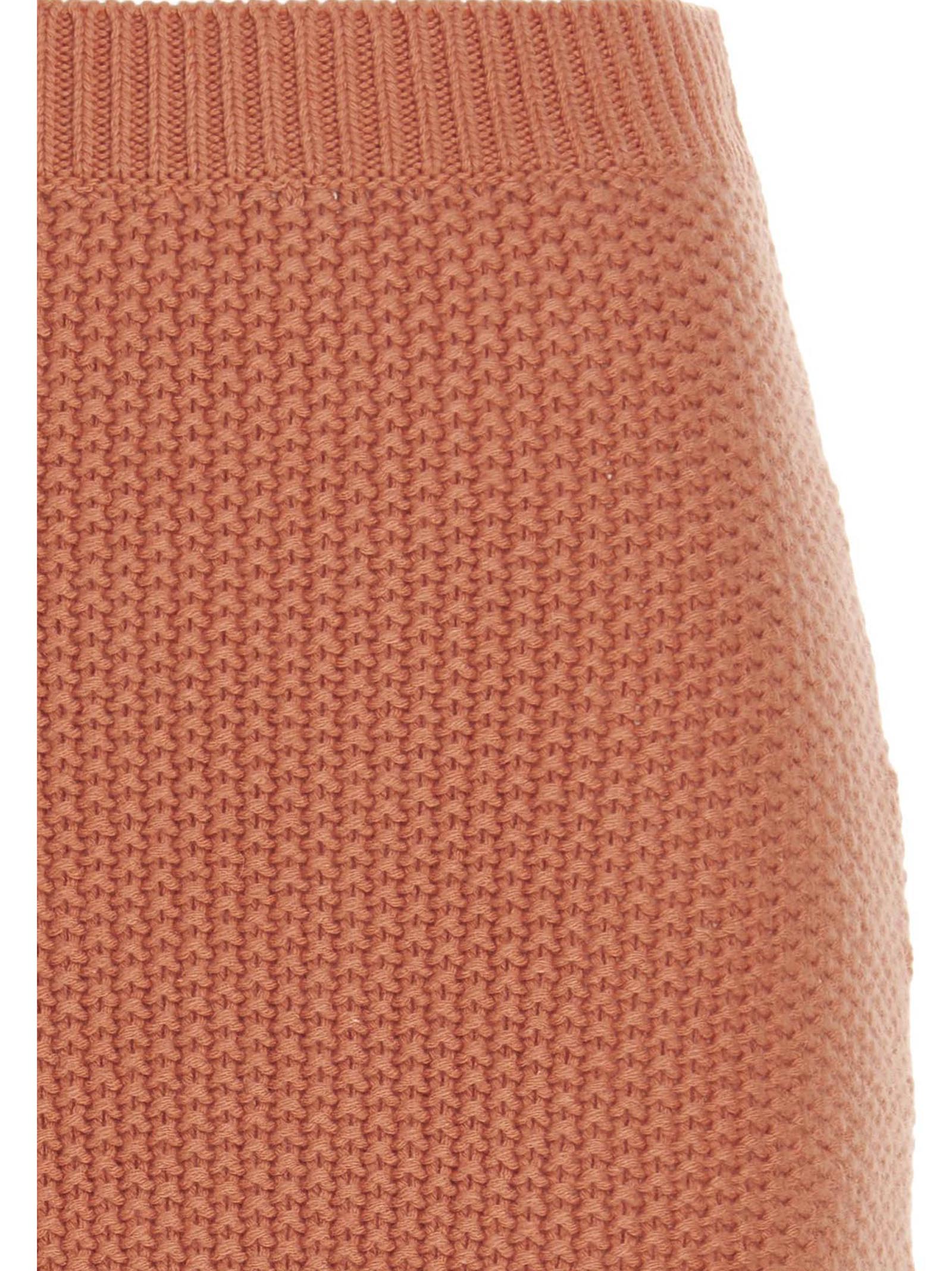Skirt by Chloé for women in cashmere orange features a contoured silhouette from the Women's Cashmere Mini Skirt collection, characterized by its contoured mini for a contoured finish.