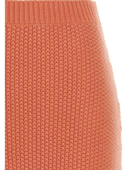 Skirt by Chloé for women in cashmere orange features a contoured silhouette from the Women's Cashmere Mini Skirt collection, characterized by its contoured mini for a contoured finish.