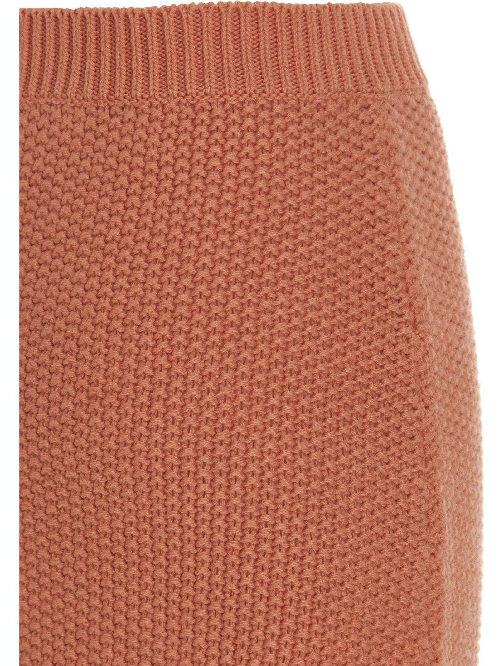 Skirt by Chloé for women in cashmere orange showcases a dramatic silhouette, artfully capturing the essence of the Women's Cashmere Mini Skirt in a dramatic mini cut for a refined look.