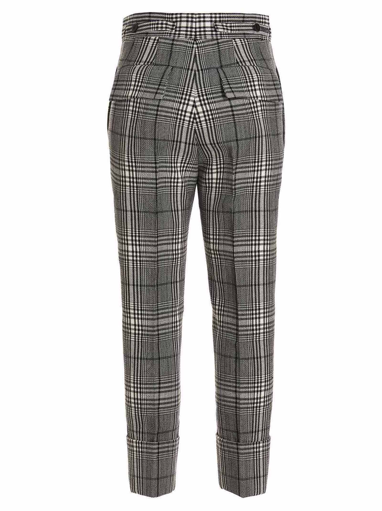Trousers by SAPIO for women in wool bicolour, black, white & patterned features a tailored silhouette with a tailored straight-leg, defined by its long and a sophisticated .
