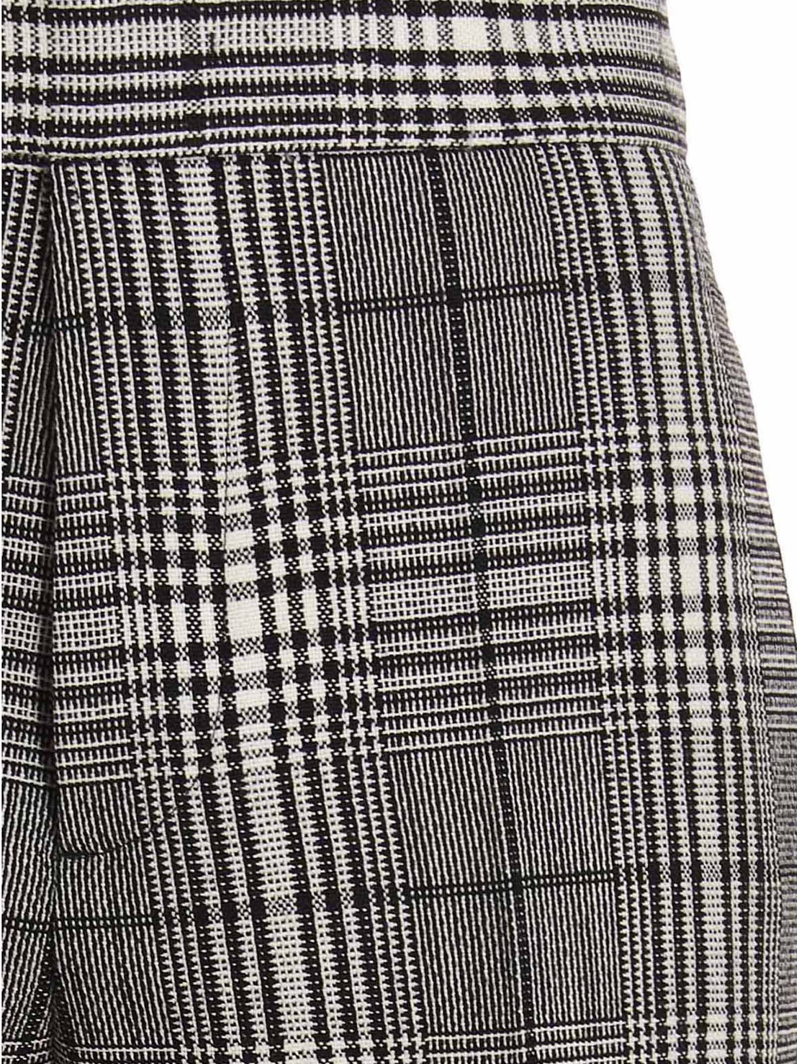 Trousers by SAPIO for women in wool bicolour, black, white & patterned features an on trend silhouette, showcasing a sophisticated straight-leg with a long and for an on trend finish.