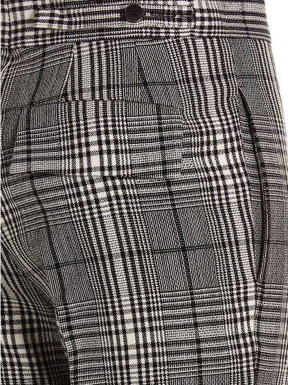 Trousers by SAPIO for women in wool bicolour, black, white & patterned features a tailored silhouette with a tailored straight-leg, defined by its long and a sophisticated .