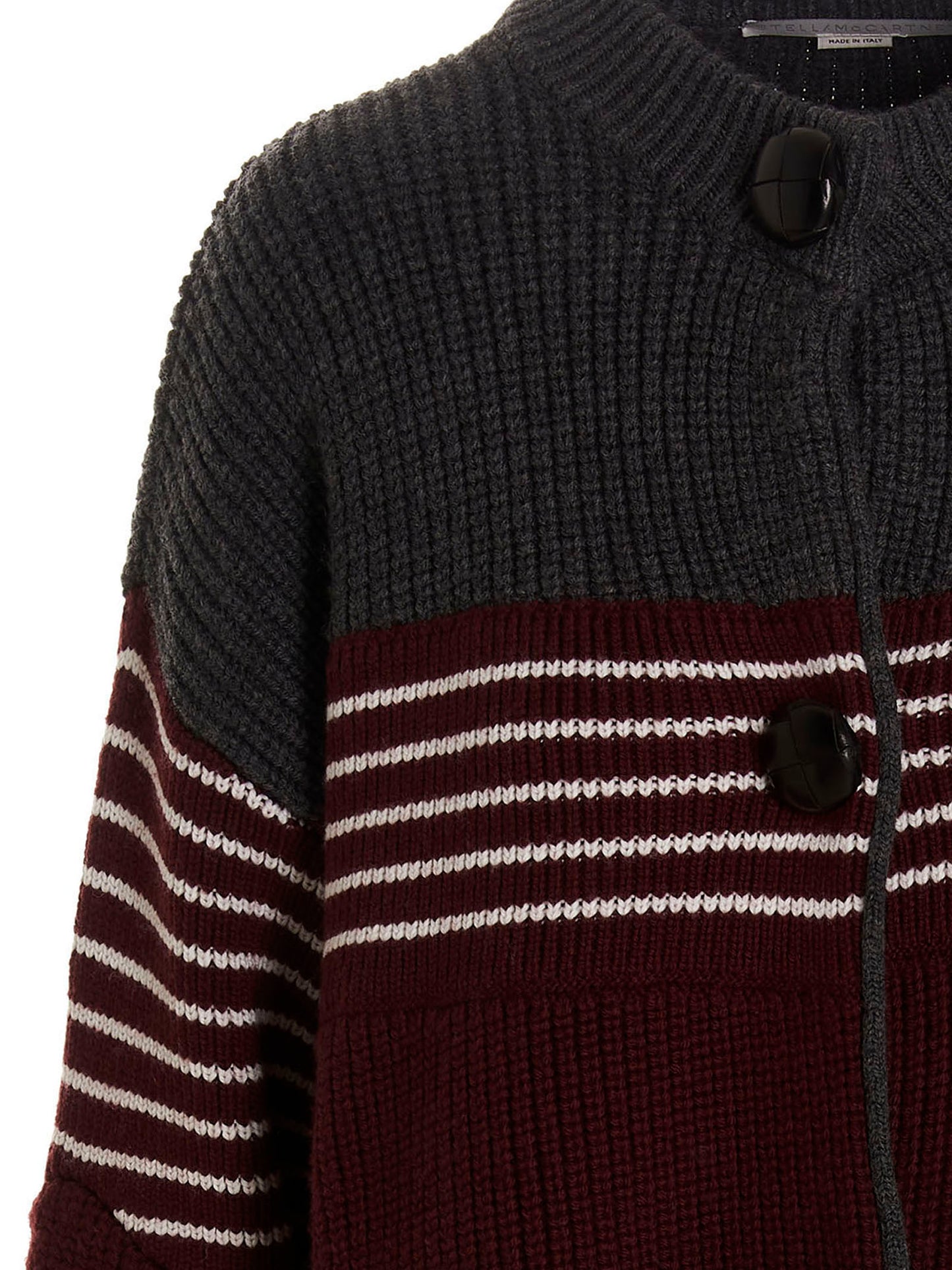 Overcoat by Stella McCartney for women in virgin wool multicolor & striped showcases a architectural silhouette, artfully detailed with a distinctive and functional pockets for a architectural finish.