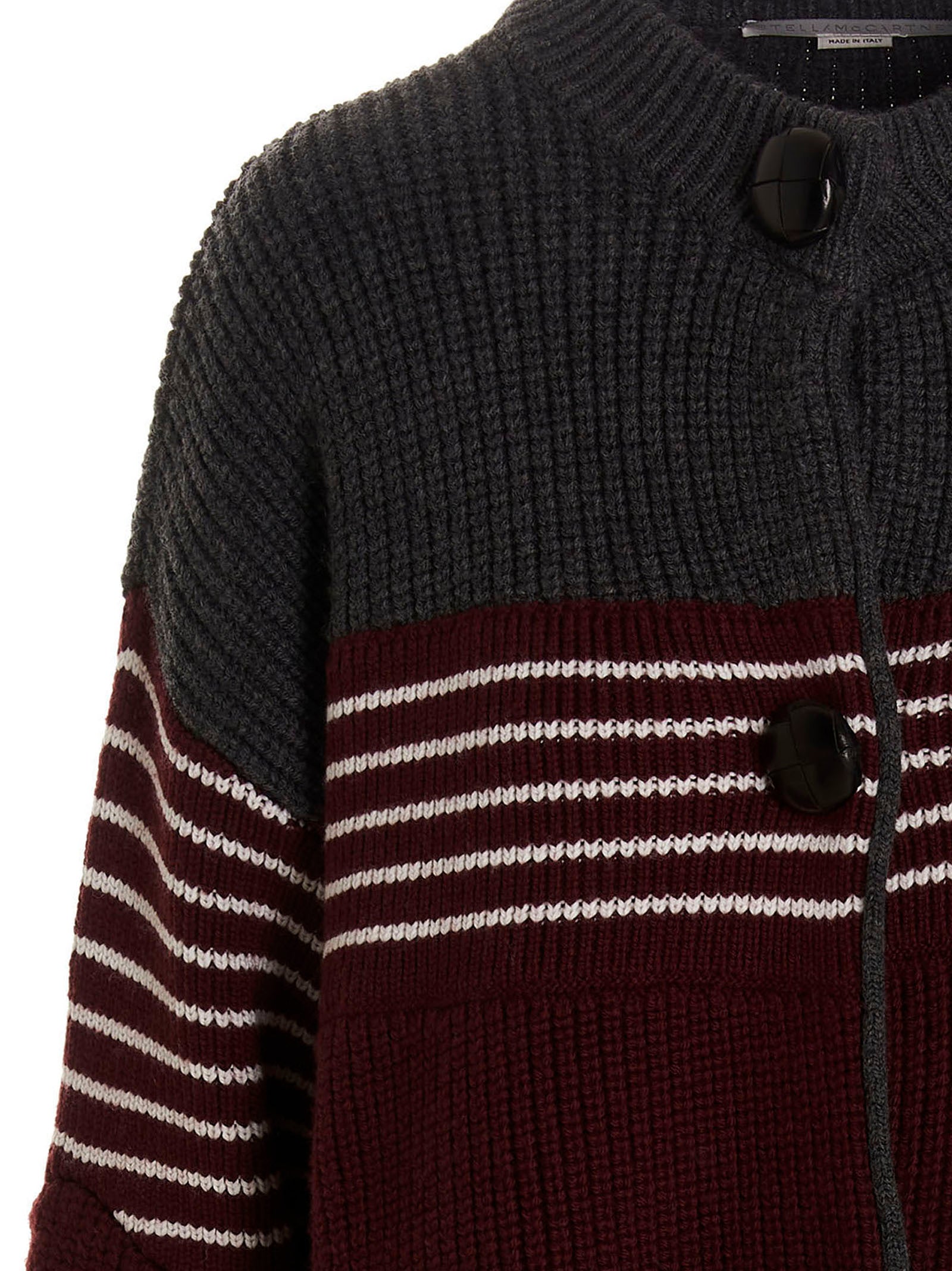 Overcoat by Stella McCartney for women in virgin wool multicolor & striped showcases a architectural silhouette, artfully detailed with a distinctive and functional pockets for a architectural finish.