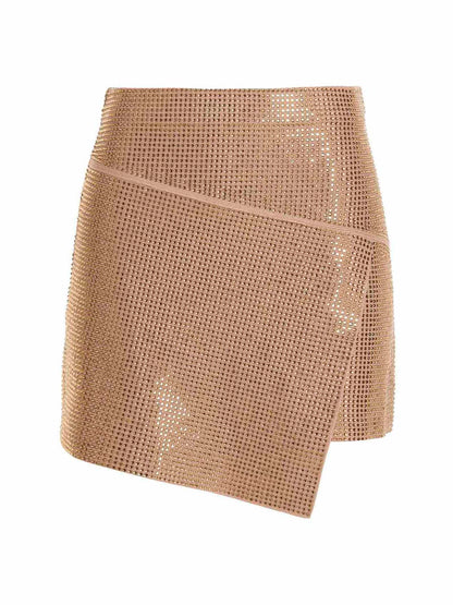 Skirt by ANDREĀDAMO for women in viscose & polyester sequins beige showcases a sultry silhouette, elegantly defined by its short long and the sophisticated sultry design of the Women's Viscose & Polyester Sequins Short Long Skirt.