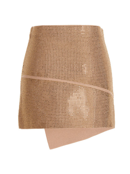 Skirt by ANDREĀDAMO for women in viscose & polyester sequins beige showcases a dramatic silhouette, artfully capturing the essence of the Women's Viscose & Polyester Sequins Short Long Skirt in a dramatic short long cut for a refined look.