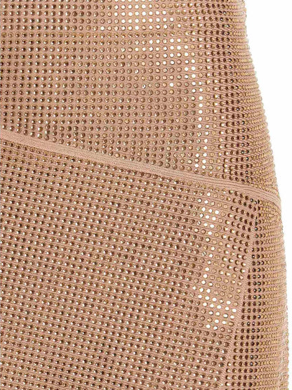 Skirt by ANDREĀDAMO for women in viscose & polyester sequins beige features a sublime silhouette, showcasing the sublime design of the Women's Viscose & Polyester Sequins Short Long Skirt in a sophisticated short long.