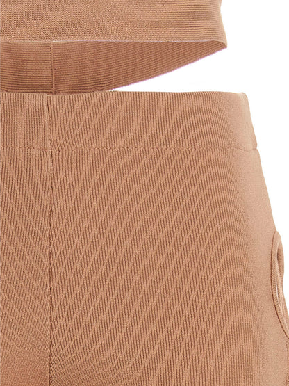 Trousers by ANDREĀDAMO for women in viscose polyester & polyamide beige features an sartorial silhouette, showcasing a precise flared and long with a sartorial for a refined look.