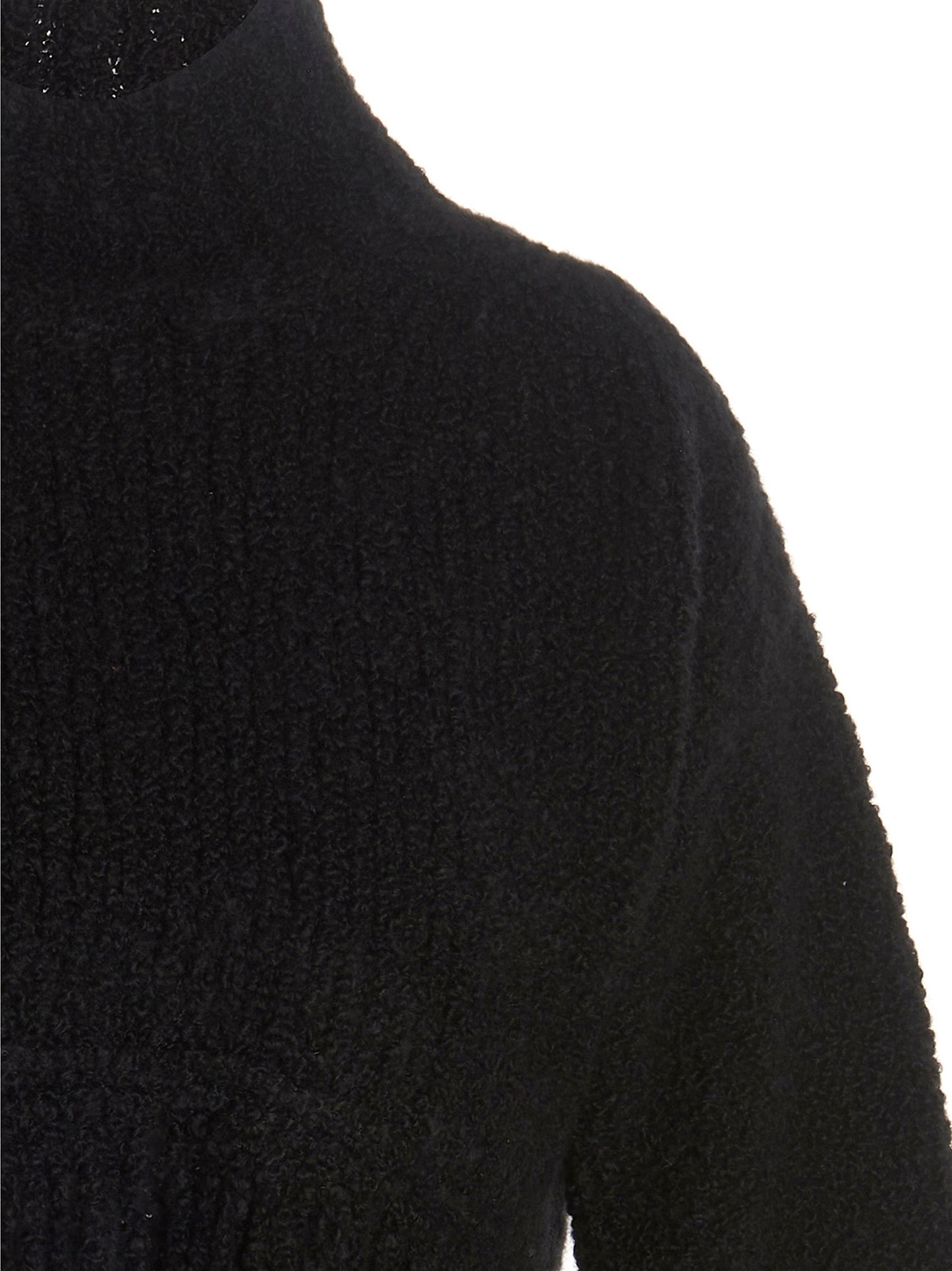 Cardigan by MIXIK for women in cashmere black showcases a captivating silhouette, artfully detailed with a captivating and for a truly sophisticated captivating look.