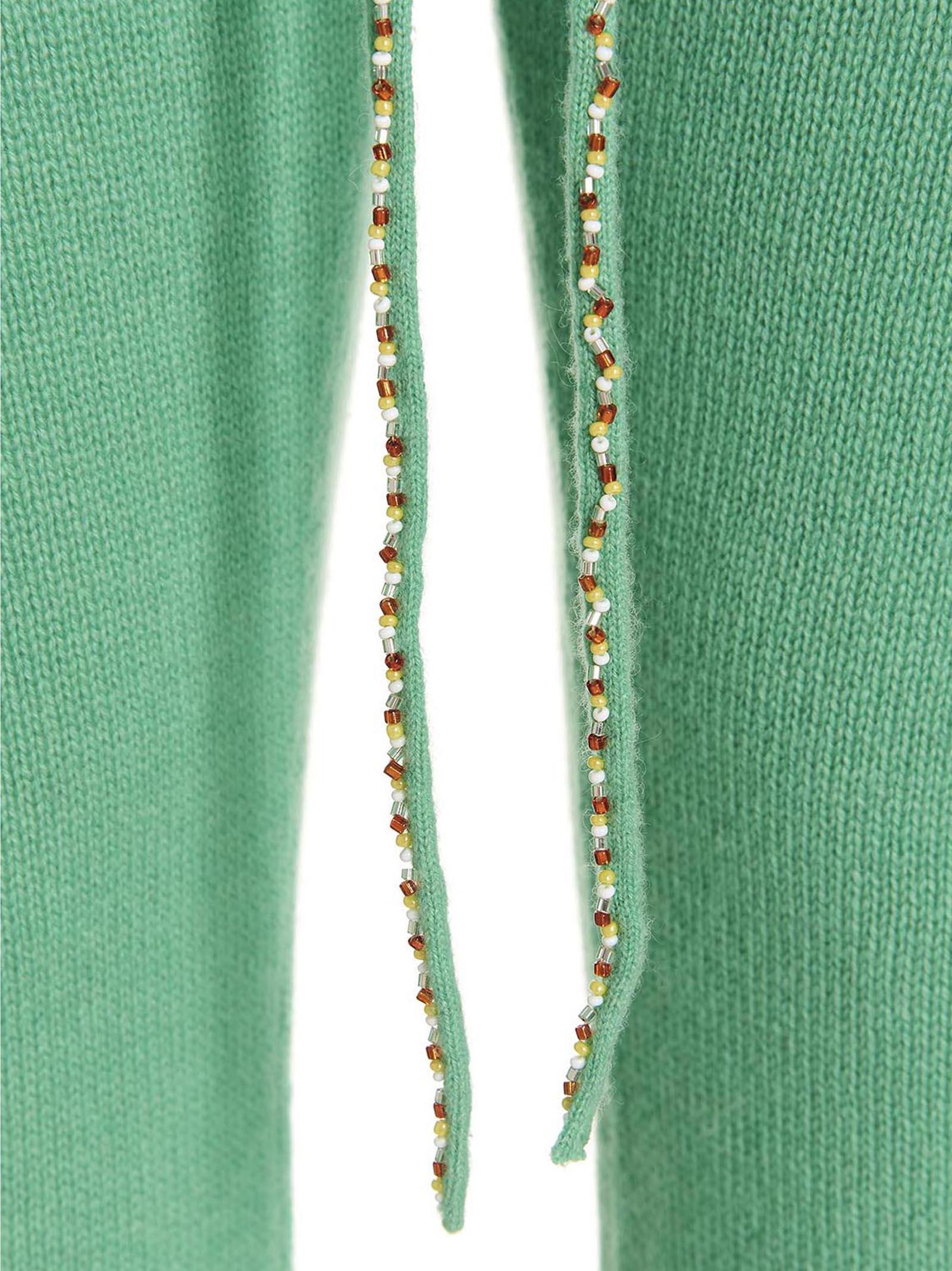 Trousers by MIXIK for women in cashmere bicolour & green presents a smart silhouette, meticulously detailed with a smart , a smart long, and a smart .