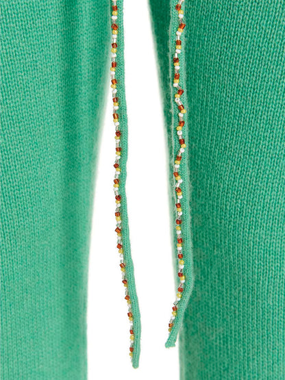 Trousers by MIXIK for women in cashmere bicolour & green presents a smart silhouette, meticulously detailed with a smart , a smart long, and a smart .