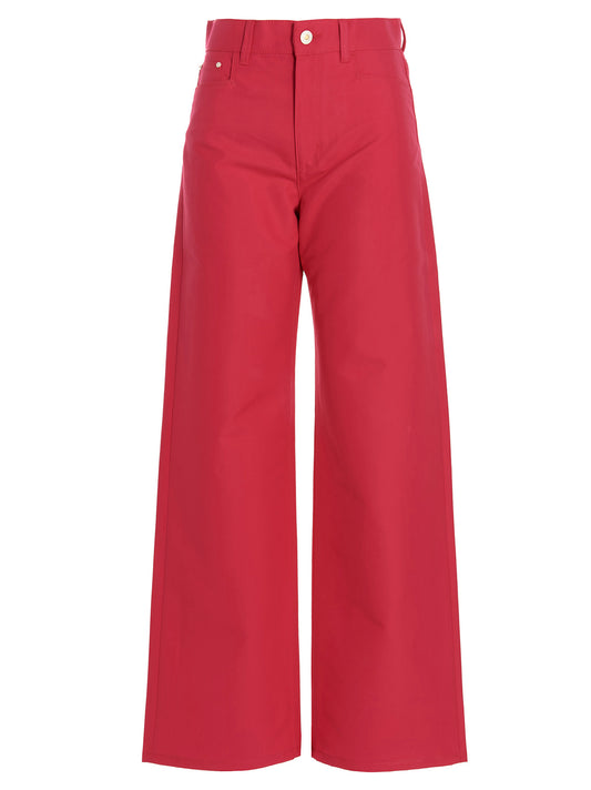 Trousers by Wandler for women in cotton & leather fuchsia features a tailored silhouette with a tailored relaxed-fit, defined by its long and a sophisticated .