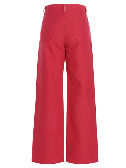 Trousers by Wandler for women in cotton & leather fuchsia presents a perennial silhouette, meticulously tailored with a relaxed-fit cut, long finish, and an elegant .