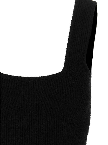 Dress by Wardrobe.Nyc for women in stretch polyamide cotton black features an cute silhouette, detailed with a and that elegantly flows into a cute midi.