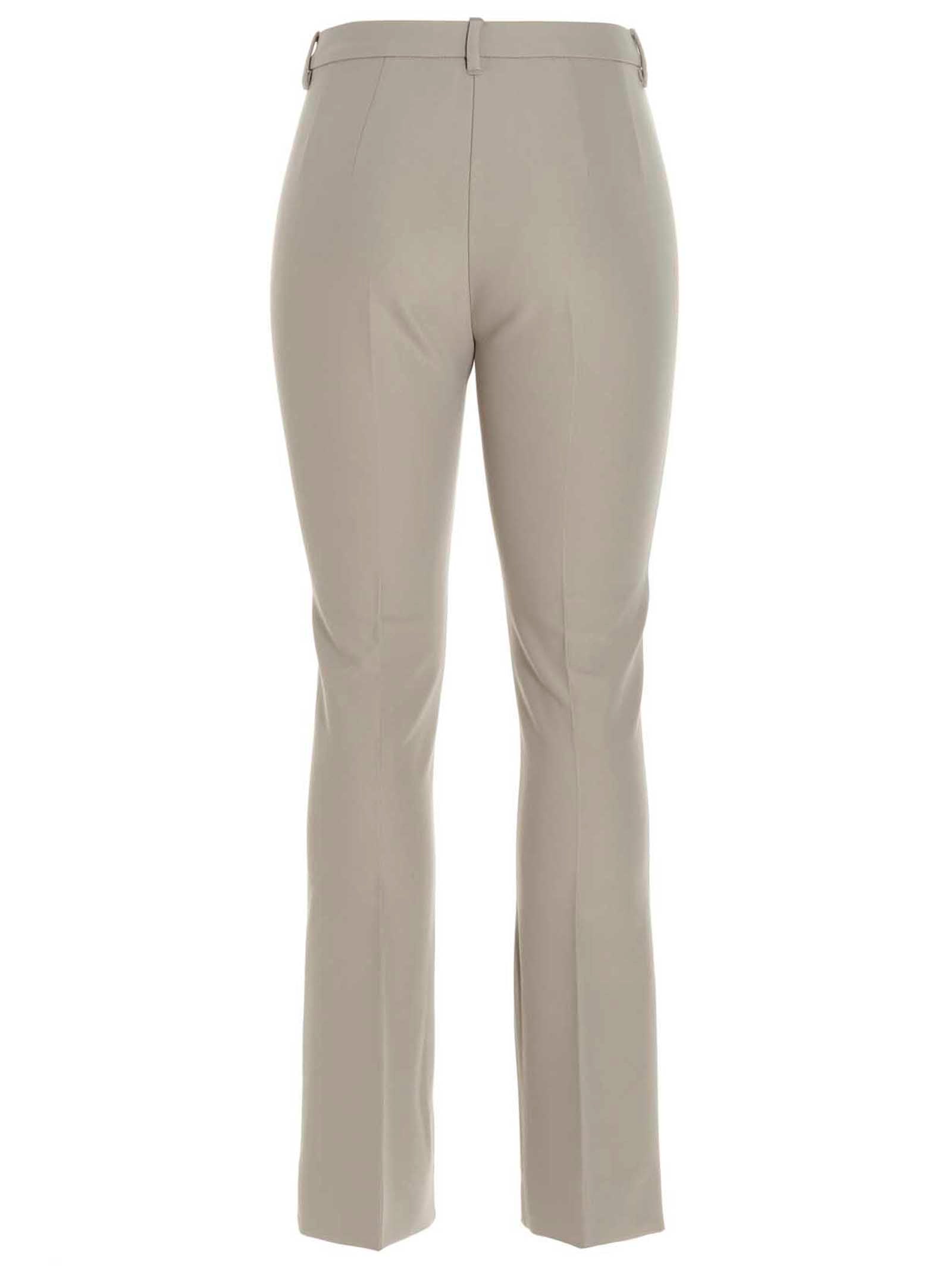 Trousers by S Max Mara for women in stretch viscose cotton beige presents a smart silhouette, meticulously detailed with a smart flared, a smart long, and a smart .