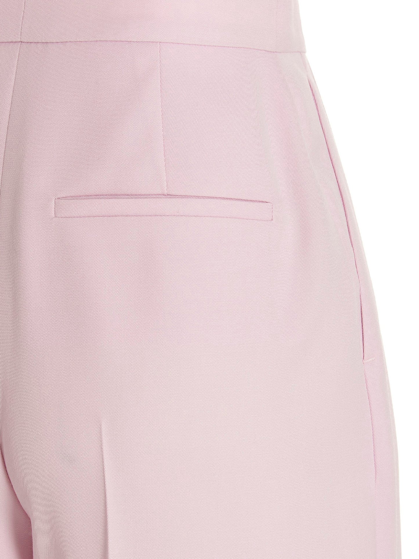 Casual Pants by Alexander McQueen for women in wool multicolor & pink features an sophisticated and with a precise long, creating a sophisticated and sophisticated silhouette.