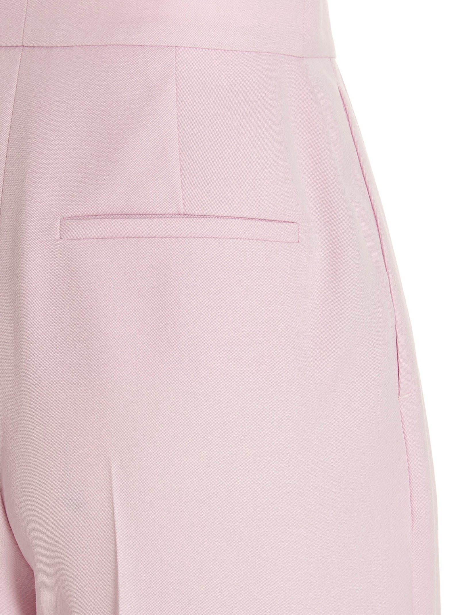 Casual Pants by Alexander McQueen for women in wool multicolor & pink features an sophisticated and with a precise long, creating a sophisticated and sophisticated silhouette.
