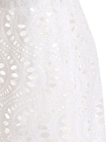 Skirt by Giambattista Valli for women in cotton white showcases a dramatic silhouette, artfully capturing the essence of the Women's Cotton Skirt in a dramatic mini cut for a refined look.