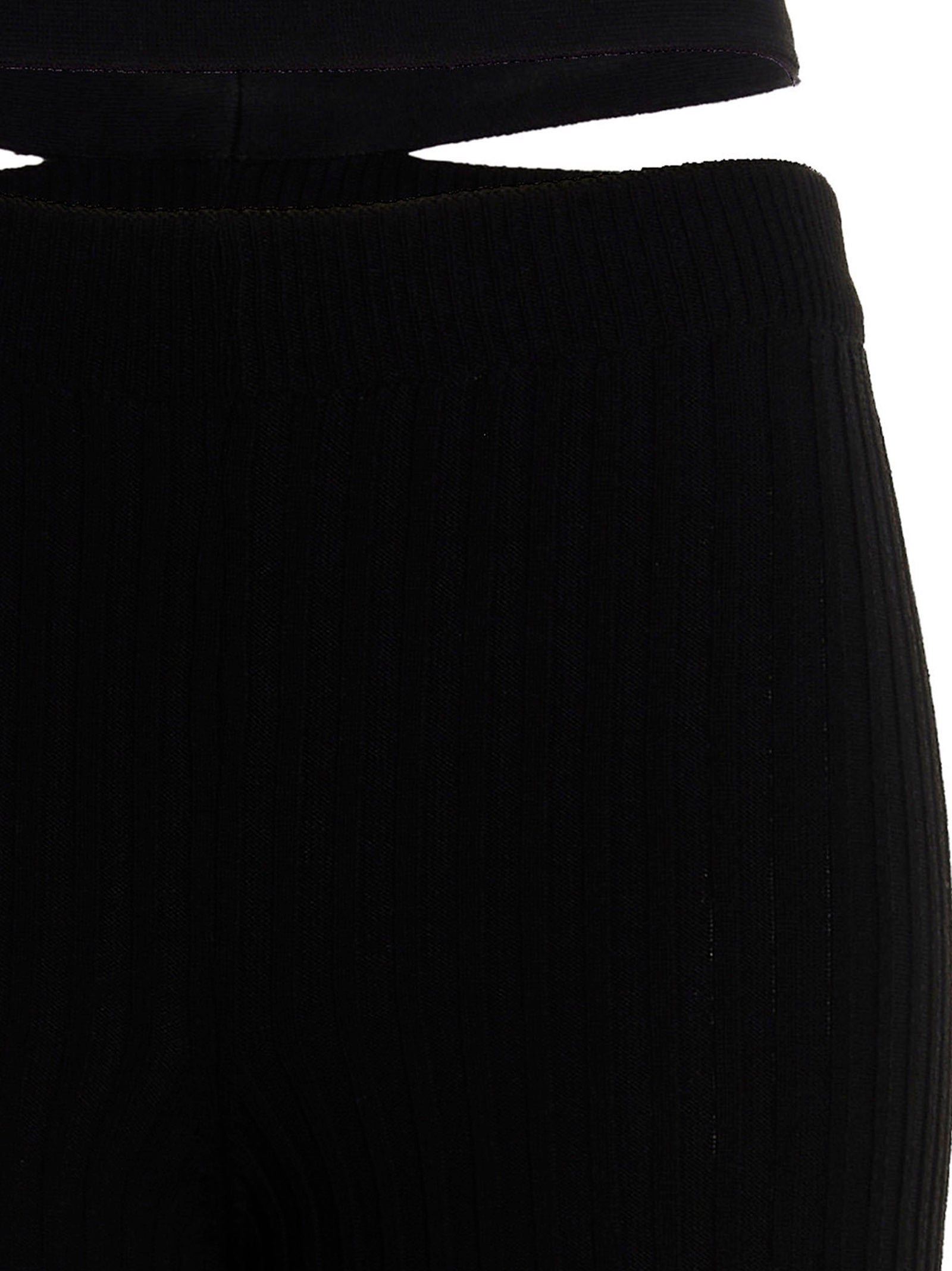 Trousers by ANDREĀDAMO for women in viscose polyester & polyamide black features an sartorial silhouette, showcasing a precise flared and long with a sartorial for a refined look.