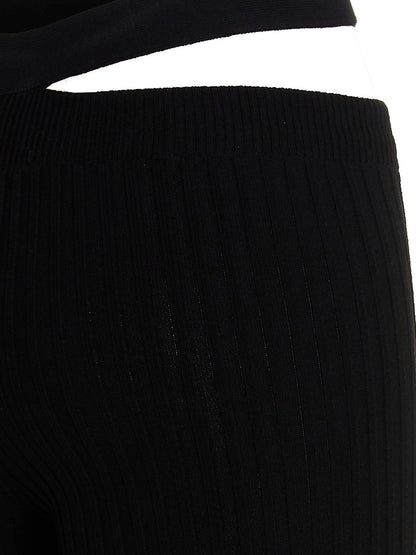 Trousers by ANDREĀDAMO for women in viscose polyester & polyamide black features an sartorial silhouette, showcasing a precise flared and long with a sartorial for a refined look.