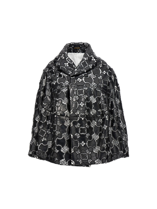 Jacket by Comme Des Garçons for women in polyethylene polyurethane leather bicolour, black, white & patterned presents a authentic silhouette, artfully detailed with a authentic and functional for a premium authentic finish.