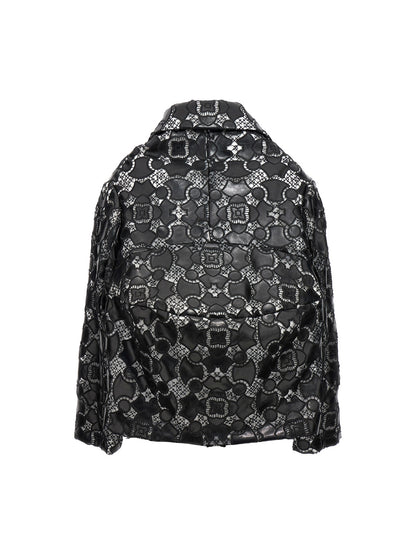Jacket by Comme Des Garçons for women in polyethylene polyurethane leather bicolour, black, white & patterned presents a impeccable silhouette, showcasing distinct and a impeccable for a sophisticated finish.