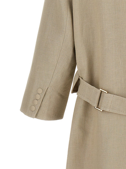 Trench Coat by Max Mara for women in linen beige features an dramatic silhouette, perfectly showcasing the elegant and sophisticated pockets for a truly dramatic aesthetic.